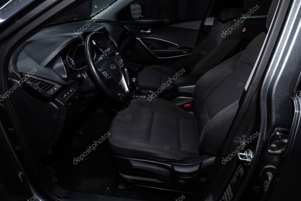 Novosibirsk, Russia - January 25, 2019:  Hyundai Santa Fe, close-up of the dashboard, seats and steering wheel. Photography of a modern car on a parking in Novosibirs