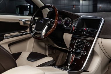 Novosibirsk, Russia -  January 25, 2019:  Volvo XC60,   close-up of the dashboard, seats and steering wheel. Photography of a modern car on a parking in Novosibirs clipart
