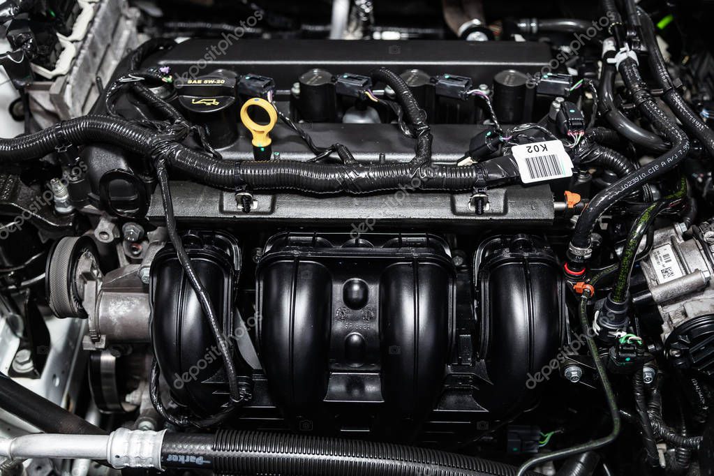 Novosibirsk, Russia -February 01, 2019: Ford Mondeo, close-up of the engine, front view. Photography of a modern car on a parking in Novosibirs