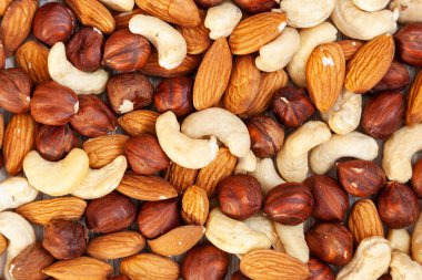 Soyulmuş badem, kaju fıstığı, fındık desen. Makro fındık çeşitli arka plan dokusu