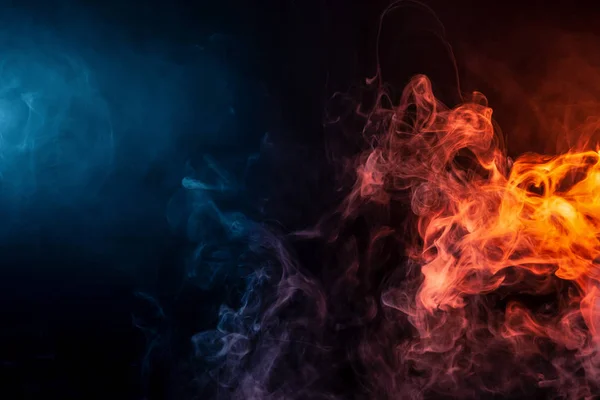 Blue and red bomb smoke on black isolated  background