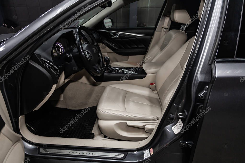 Novosibirsk, Russia - February 10, 2019:  Infiniti Q50, close-up of the dashboard, speedometer, tachometer, seats and steering wheel. Photography of a modern car on a parking in Novosibirsk