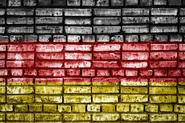 National flag of Germany on a brick background. Concept image for Germany: language , people and culture.