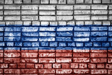 Bir tuğla zemin üzerine ulusal bayrak Rusya'nın. Rusya için kavram görüntü: dil, insanlar ve kültür.