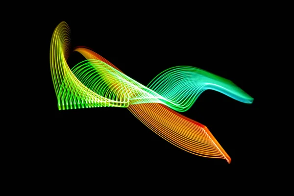 Colorful blue, yellow, green and orange neon spiral lines.Abstract background of blue neon glowing light shapes.  Bright stripes for poster, website, brochure, print.