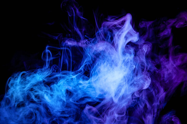 Blue and purple smoke on black backgroun
