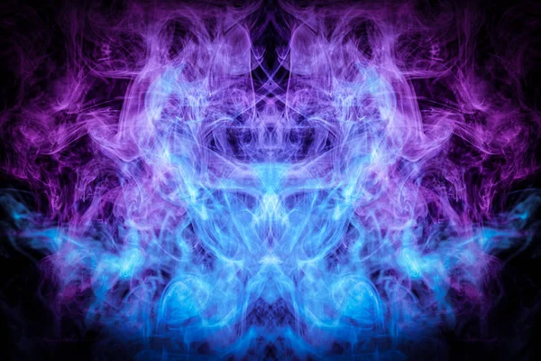 Fantasy print for clothes: t-shirts, sweatshirts.  Colorful pink and blue smoke in the form of a skull, monster, dragon on a black isolated background. Background from the smoke of vap