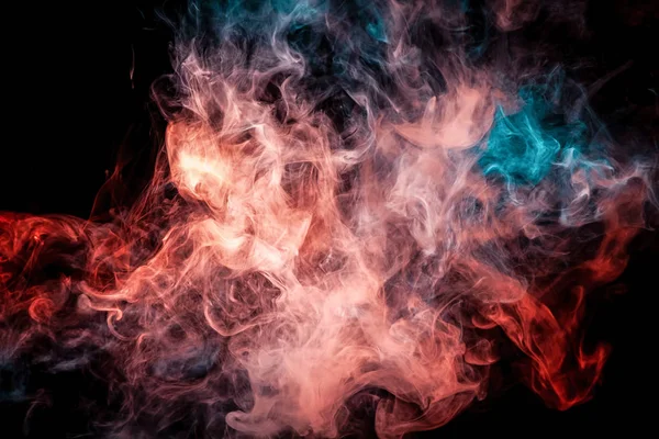 Close up swirling  red and blue smoke on black isolated backgroun