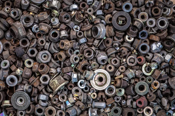 Flat Lay metal fasteners: washers, nuts, vinitiki, screws,, top view. Close-up Carpenter\'s Tool Ki