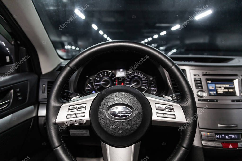 Novosibirsk, Russia - March 10, 2019:  Subaru Outback,close-up of the dashboard, speedometer, tachometer and steering wheel. Photography of a modern car on a parking in Novosibirs