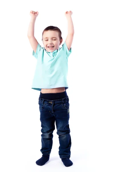 Glimlachend Jongetje Met Donkere Haren Spijkerbroek Blauwe Polo Shirt Springen — Stockfoto