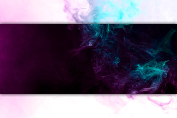 Abstract art colored smoke on black and white isolated background. Stop the movement of multicolored smoke on dark backgroun