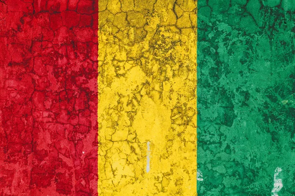 Bandiera Nazionale Della Guinea Sullo Sfondo Della Vecchia Parete Ricoperta — Foto Stock
