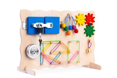 Wooden eco-friendly busy board-educational toy for children, babies on a white isolated background, consisting of a flashlight, beads, a maze, a lock with a key, roller, bell, gears. clipart
