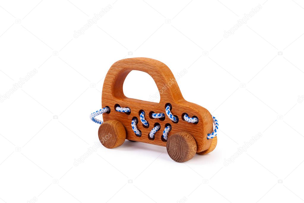 Photo of a wooden car lacing truck made of beech on a white isolated background