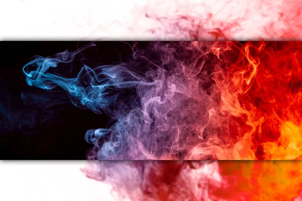 Close up swirling red and blue smoke on black isolated backgroun