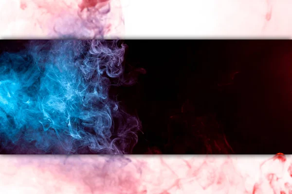 Colorful red and blue smoke  on a black and white isolated background. Background from the smoke of vap