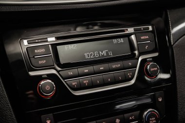 Novosibirsk, Russia - May 06, 2019:  Nissan Xtrail,close-up of the dashboard,  player. Photography of a modern car on a parking in Novosibirs