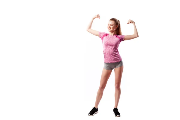 Eine Dunkelhaarige Trainerin Sportlich Pinkfarbenen Kurzen Shirts Und Shorts Zeigt — Stockfoto