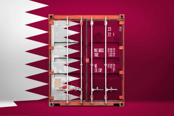 The concept of  Qatar export-import, container transporting and national delivery of goods. The transporting container with the national flag of Qatar, view front