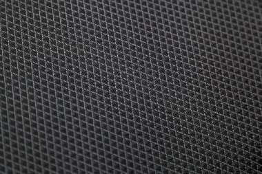 Yakın çekim siyah araba koltuk döşeme. Yumuşak kaba karbon kumaş dokusu.