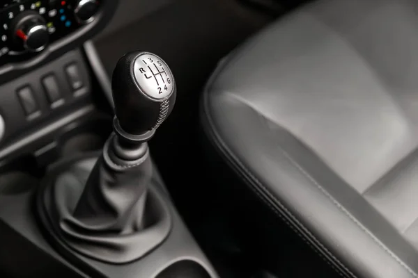 Close up of the automatic gearbox lever, blackinterior car; Automatic transmission gearshift stick;