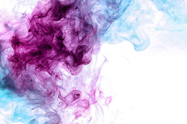 Colorful pink and blue smoke  on a white isolated background. Background from the smoke of vap
