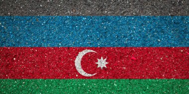 Taş arka planda Azerbaycan'ın ulusal bayrağı. Ulusal gurur kavramı ve ülkenin sembolü.