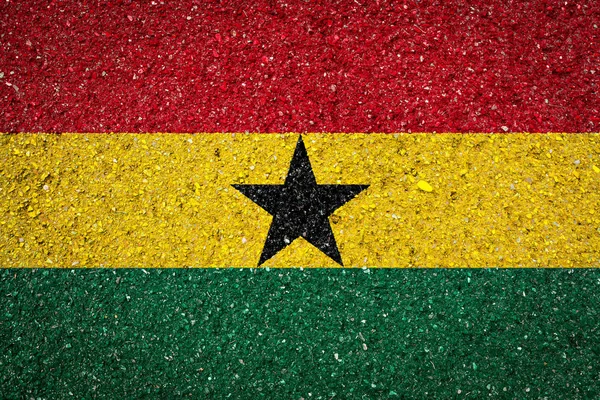 加纳国旗在石头背景上 民族自豪感的概念和国家的象征 — 图库照片