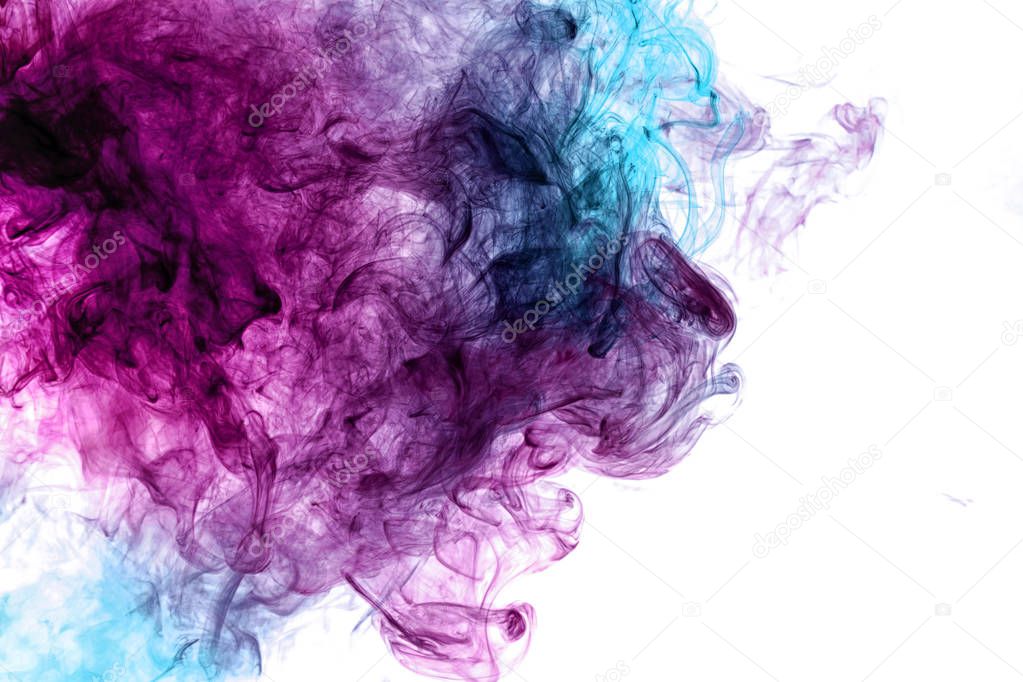 Dense multicolored smoke of   blue and pink colors on a white isolated background. Background of smoke vap