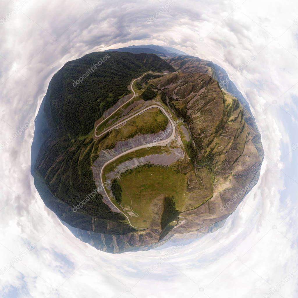 Helicopter drone shot. Aerial photography of a amazing mountains, river,forest and roads. Panoramic city 360  shot from above