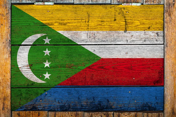 Nationale Vlag Van Comoren Een Houten Muur Achtergrond Het Concept — Stockfoto
