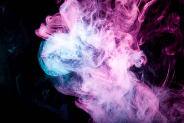 Close up swirling pink, blue, purple  smoke background