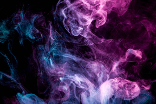 Pattern, Neon pink, blue and purple smoke in the on a dark isolated background. Background from the smoke of vape