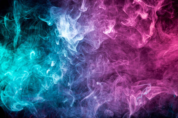 Smoke of pattern pink and blue on a dark isolated background. Scary and mysterious symbol