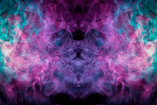 siyah arka plan üzerinde mistik ve muhteşem formları renkli buhar duman yakın. Sanat için Mocap