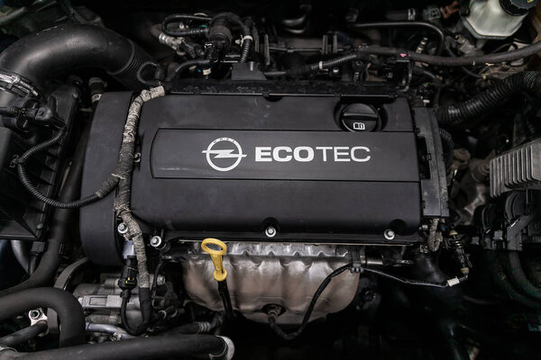Novosibirsk, Russia  August 24, 2019:  Opel Astra, Close up detail of  car engine, front view. Internal combustion engine, car parts, deteyling
