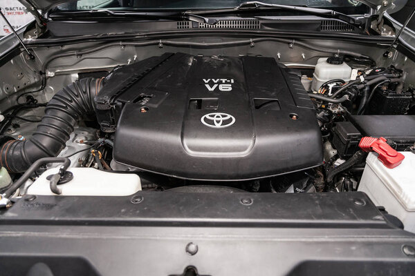 Novosibirsk, Russia  August 27, 2019:  Toyota Land Cruiser Prado , Close up detail of  car engine, front view. Internal combustion engine, car parts, deteyling