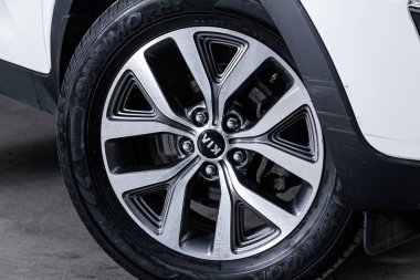Novosibirsk, Russia  September 09, 2019:  Kia Sportage,  close-up of the alloy wheel. Photography of a modern car on a parking in Novosibirsk