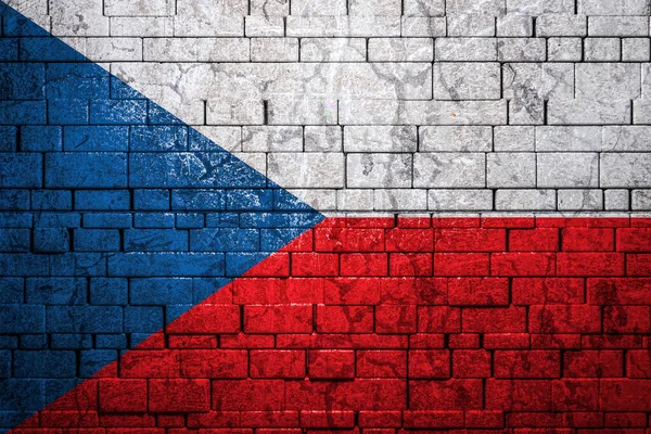 National flag of Czech on brick  wall background.The concept of national pride and symbol of the country. Flag  banner on  stone texture background.