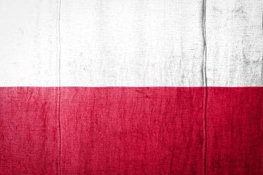 Polonya 'nın ulusal bayrağı eski tekstil boyalarıyla resmedilmiş. Kumaş dokusu arka planında bayrak pankartı.