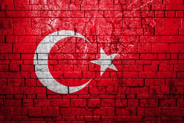 砖墙背景上的土耳其国旗 民族自豪感的概念和国家的象征 石质背景上的国旗 — 图库照片
