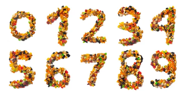 ヘーゼルナッツ アーモンド クルミ カシューナッツ レーズン 砂糖漬けの果物を混合したアラビア数字 ナッツから作られた食品パターン — ストック写真