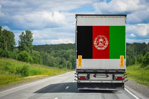 Een Vrachtwagen Met Nationale Vlag Van Afghanistan Afgebeeld Achterdeur Vervoert — Stockfoto