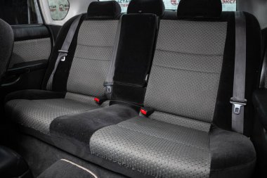 Novosibirsk/ Russia  July 07 2020: Subaru Legacy B4, Comfort car inside. Clean car interior: black back seats, headrests and belt  clipart