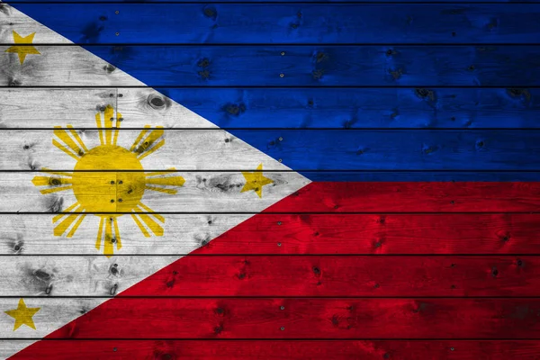 菲律宾国旗用钉子钉在连木板的营地上 国家的象征 — 图库照片