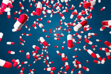 3D çizim beyaz - kırmızı kapsüller mavi arka planda rastgele sıralanır. Kapsül ilacı