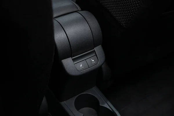 Seat heating indicator in the car included. modern car interior: parts, buttons, knob