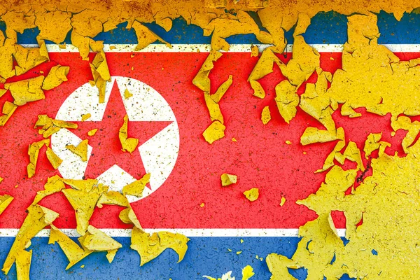 The national flag of North Korea  is painted on an old metal wall with ragged paint. Country symbol.
