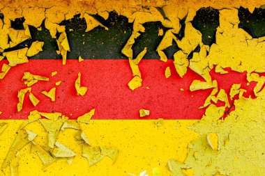 Almanya 'nın ulusal bayrağı eski metal bir duvara eski püskü boyayla boyanmış. Ülke sembolü.
